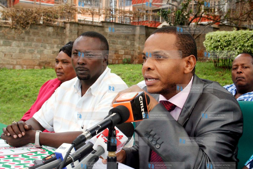 Danson Mungatana flanked by party officials briefs the media