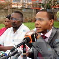 Danson Mungatana flanked by party officials briefs the media