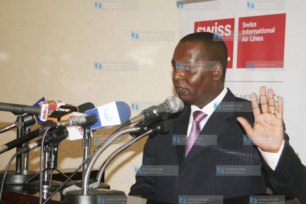 Minister for trade Amos Kimunya addresses the gathering at Nairobi hotel