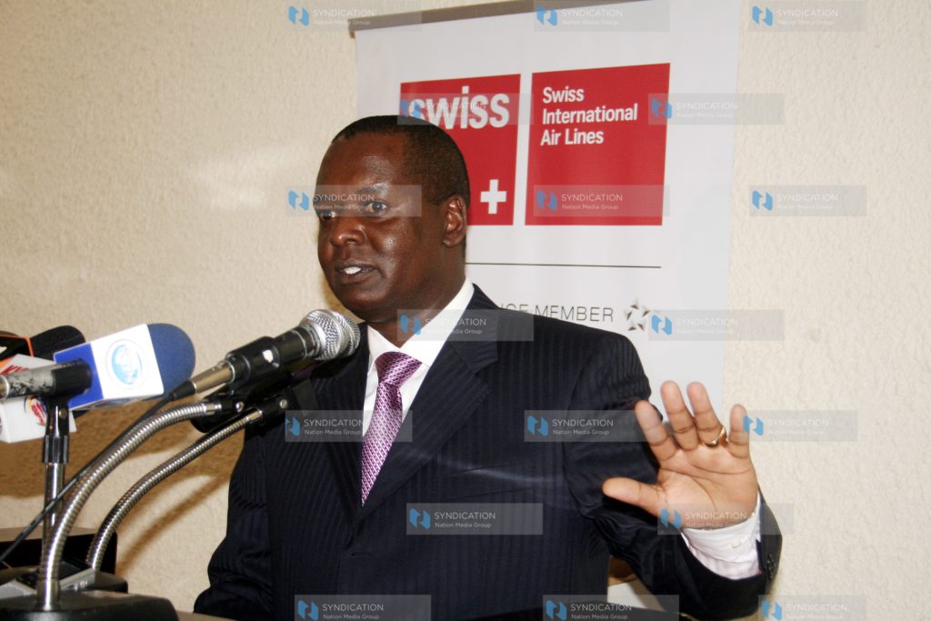 Minister for trade Amos Kimunya addresses the gathering at Nairobi hotel