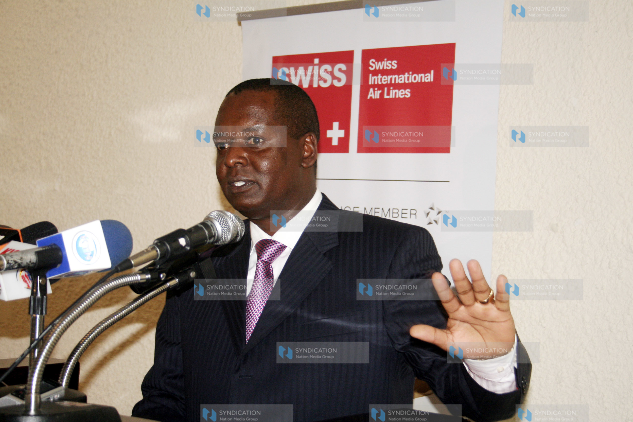 Minister for trade Amos Kimunya addresses the gathering at Nairobi hotel