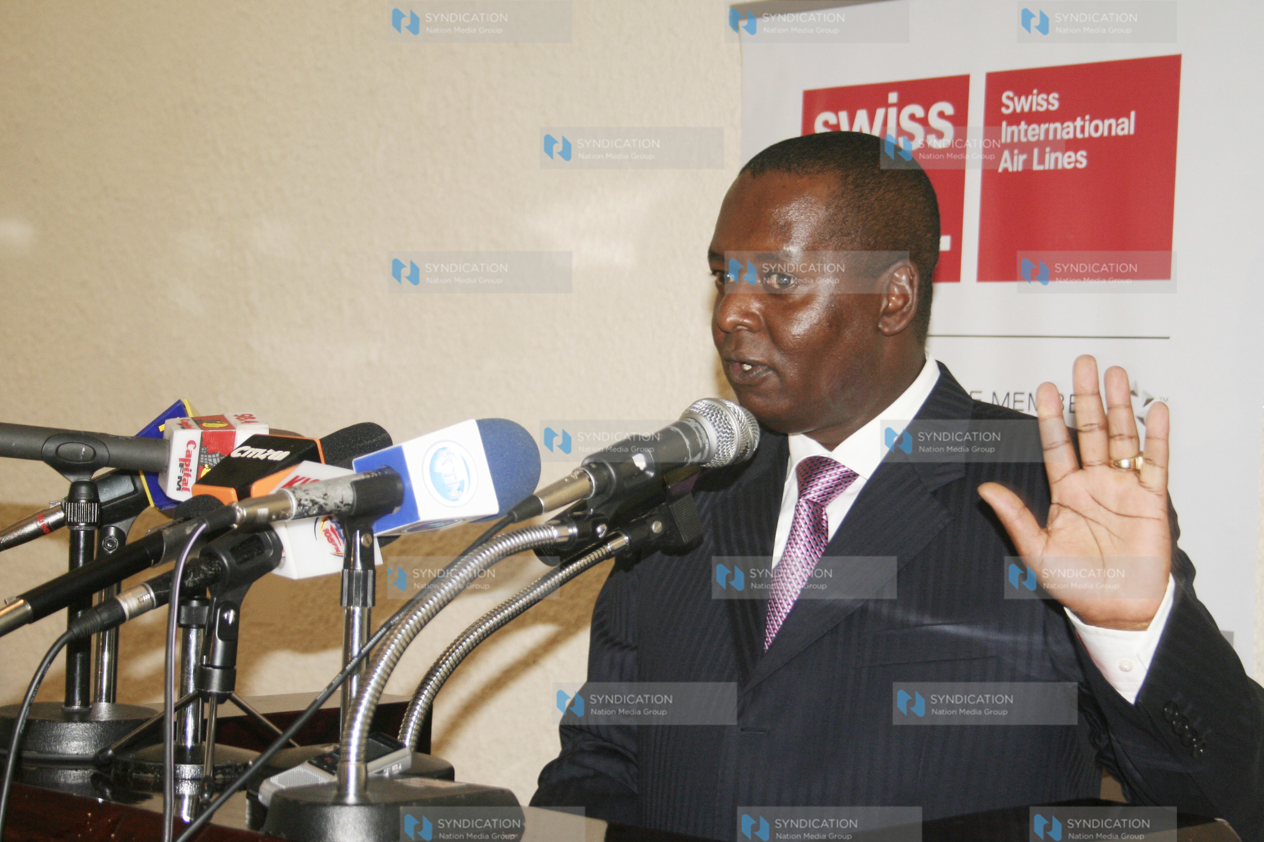 Minister for trade Amos Kimunya addresses the gathering at Nairobi hotel