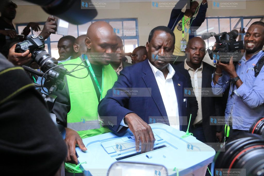 Raila Odinga casts his vote at Kibera Primary school