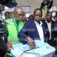 Raila Odinga casts his vote at Kibera Primary school