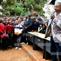 MP Babu Owino addressing students of New Kihumbuini Primary School in Kangemi