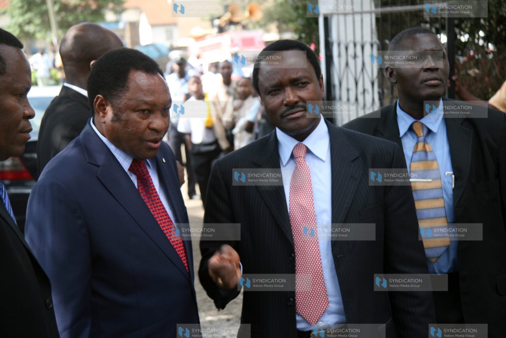 Vice president Kalonzo Musyoka chats with Nairobi PC James Waweru
