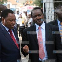 Vice president Kalonzo Musyoka chats with Nairobi PC James Waweru