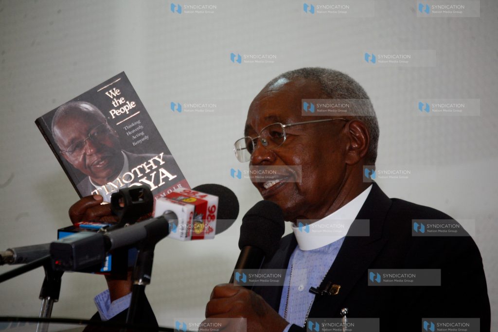 Reverend Timothy Njoya addressing guests at Daystar University