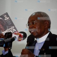 Reverend Timothy Njoya addressing guests at Daystar University