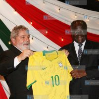 President Mwai Kibaki (right) receives a football jersey from Brazil President