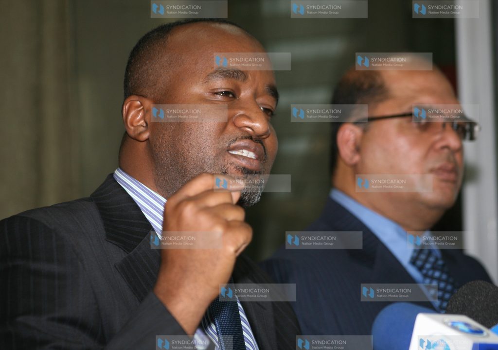 Hassan Joho (left) and Shakeer Shabbir at a media briefing