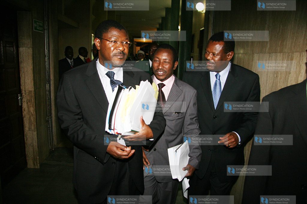 Moses Wetangula leaves carrying documents