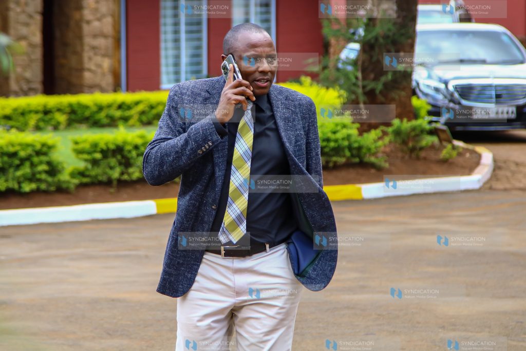 Majority Leader Kimani Ichung'wah on a call at Bomas of Kenya