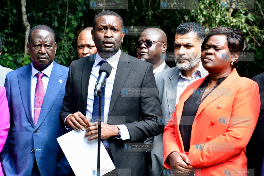 Edwin Sifuna (center) addressing a media briefing