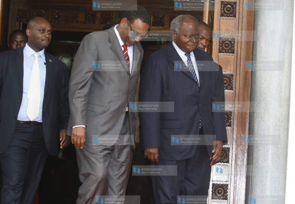 President Mwai Kibaki (right)