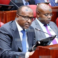 Aden Duale gestures as he addresses a joint Parliamentary committee
