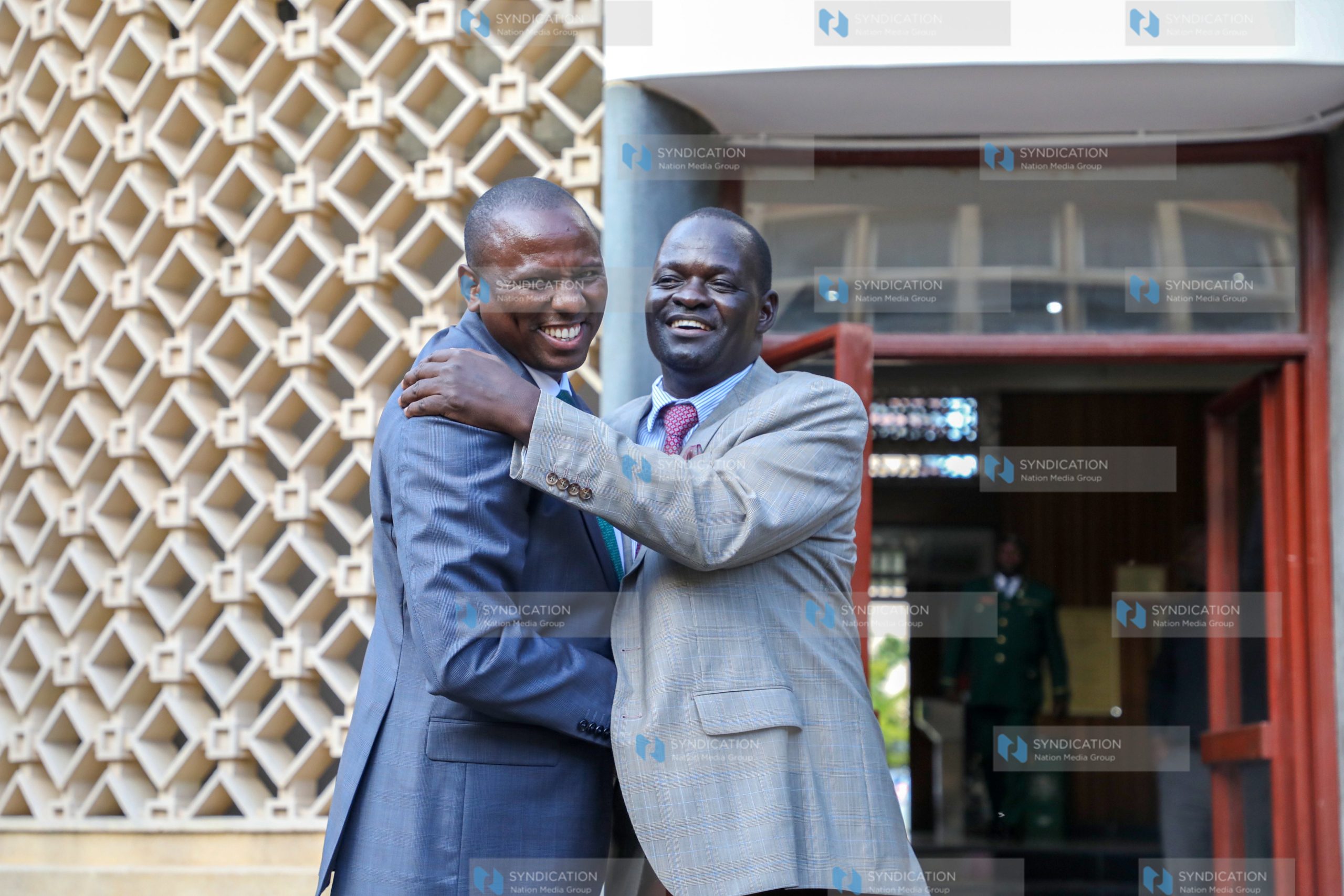 Kimani Ichung’wah and Nyando MP Jared Okello at Parliament Buildings