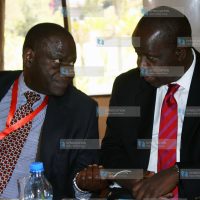 Mt Kenya University Vice Chancellor Prof. Stanley Waudo with Education Cabinet Secretary Dr Fred Matiang'i