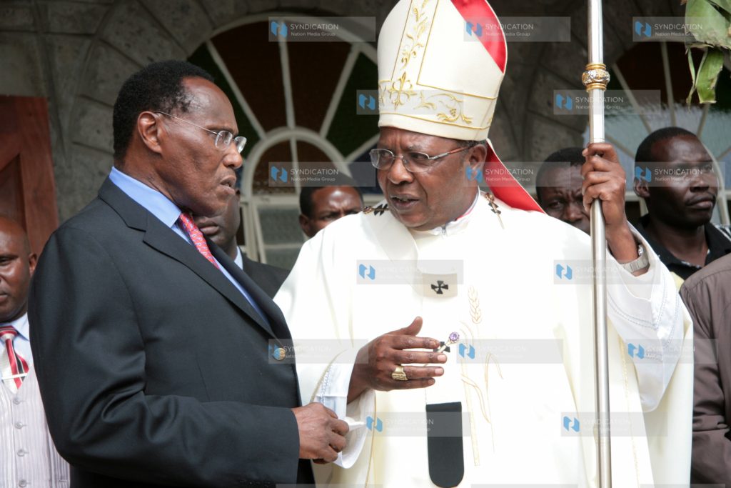 Internal Minister prof George Saitoti with Cardinal John Njue