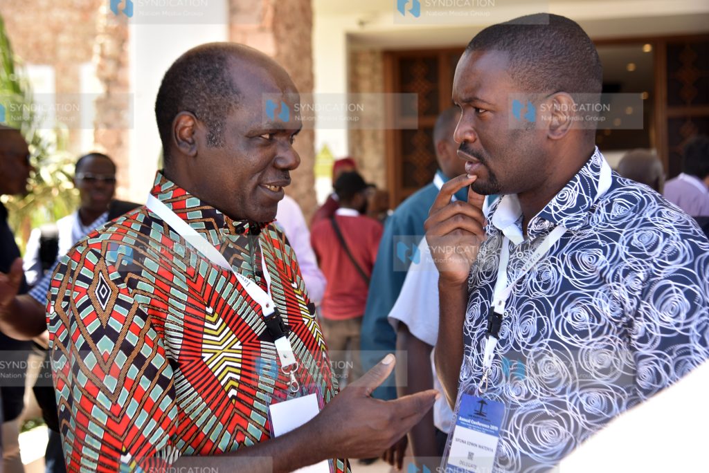 IEBC Chairperson Wafula Chebukati with ODM Secretary General Edwin Sifuna