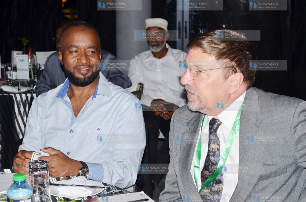 Mombasa Governor Hassan Joho (left) with Mike Sarco (right)