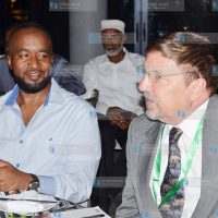 Mombasa Governor Hassan Joho (left) with Mike Sarco (right)