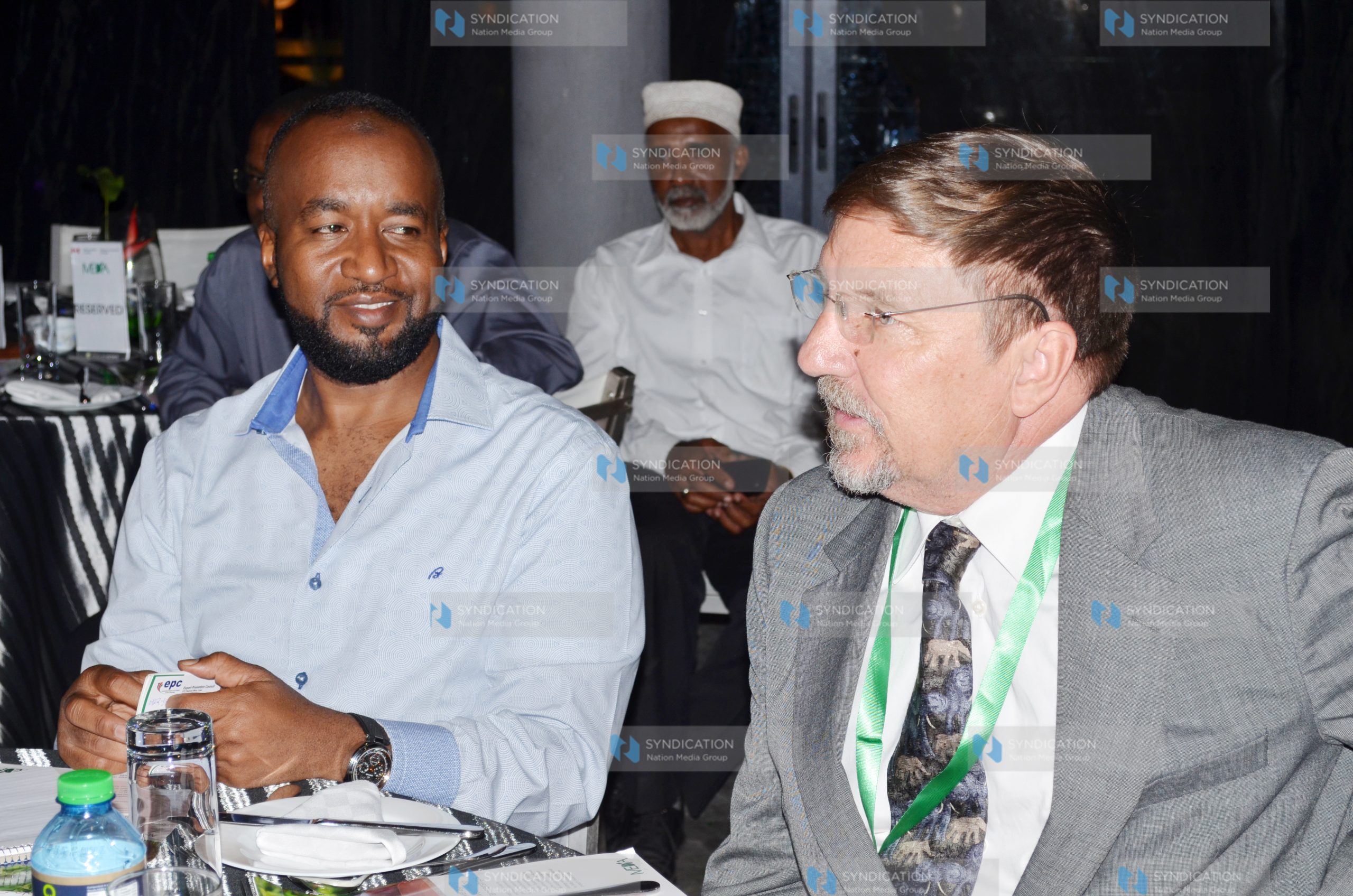 Mombasa Governor Hassan Joho (left) with Mike Sarco (right)
