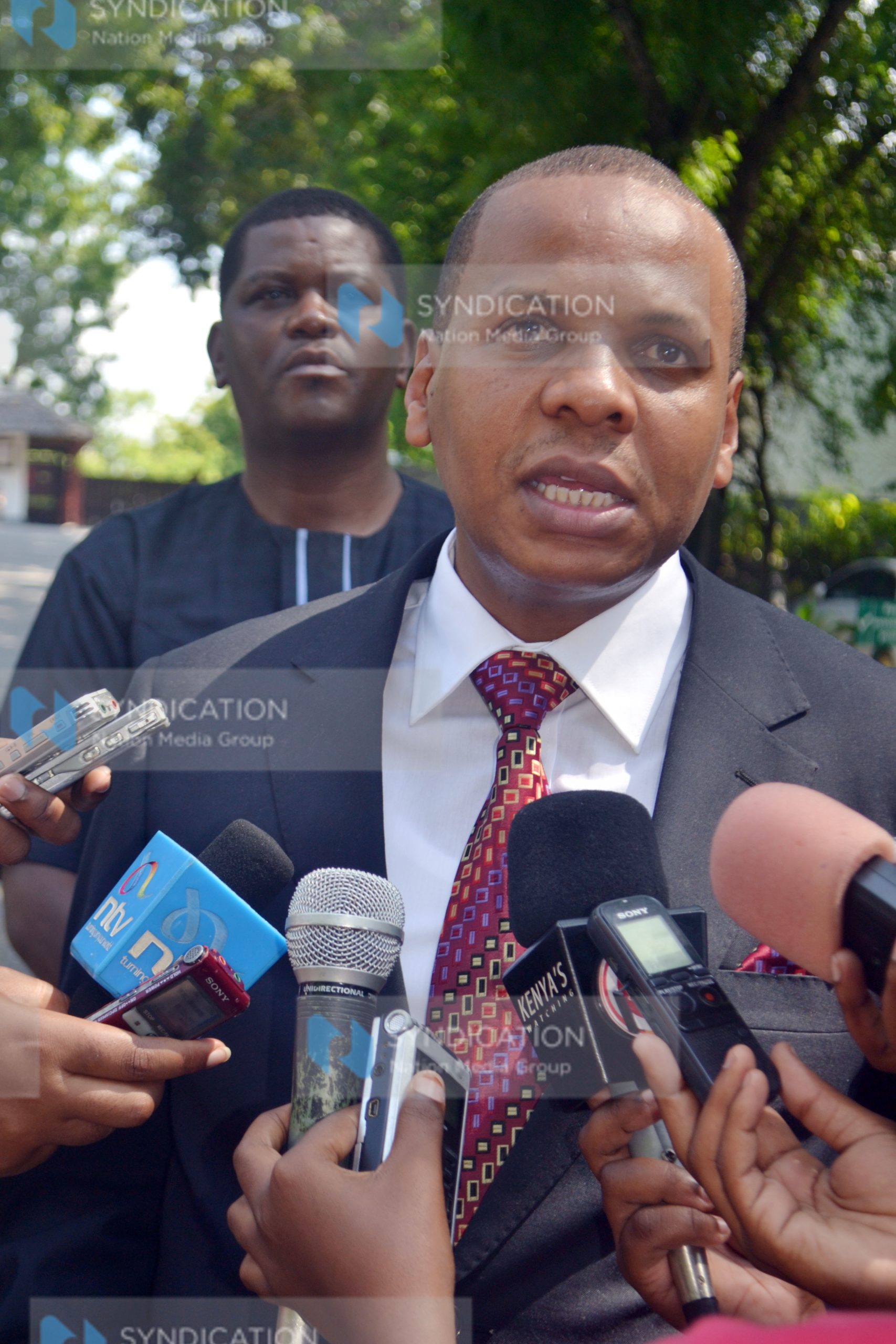 Danson Mungatana addresses members of the press