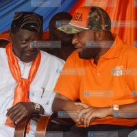 CORD Leader Raila Odinga shares a word with Mombasa Governor Hassan Joho (right)