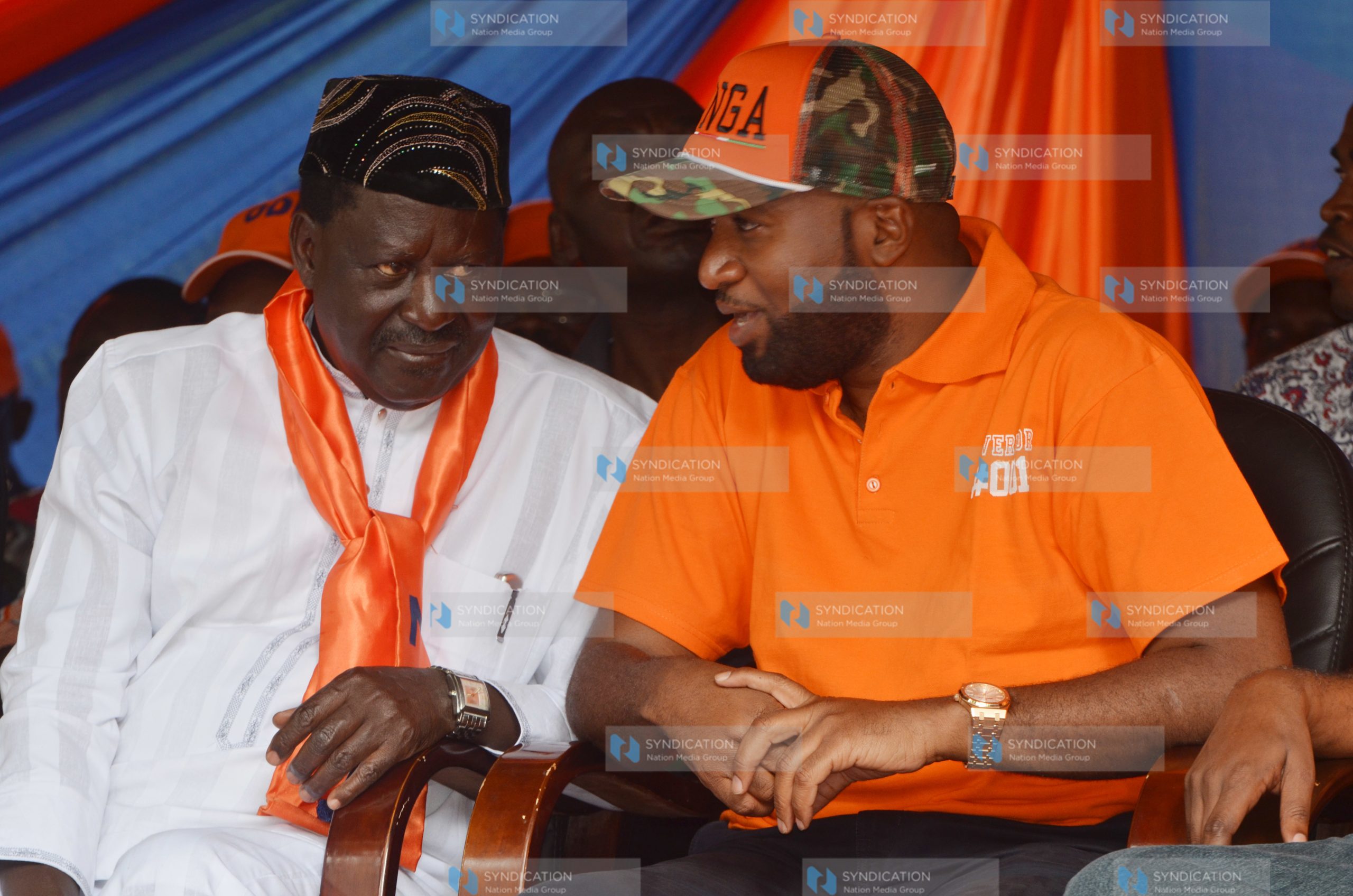 CORD Leader Raila Odinga shares a word with Mombasa Governor Hassan Joho (right)