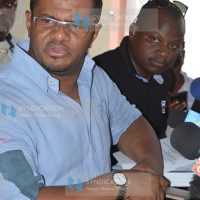 Former Mombasa Senator Hassan Omar (left) adddressing journalists