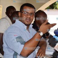 Former Mombasa Senator Hassan Omar (left) adddressing journalists