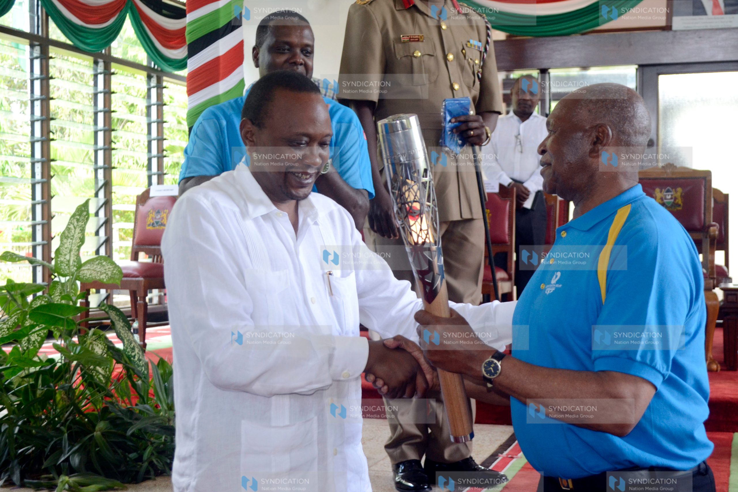 President Uhuru Kenyatta hands over the Queen’s Barton