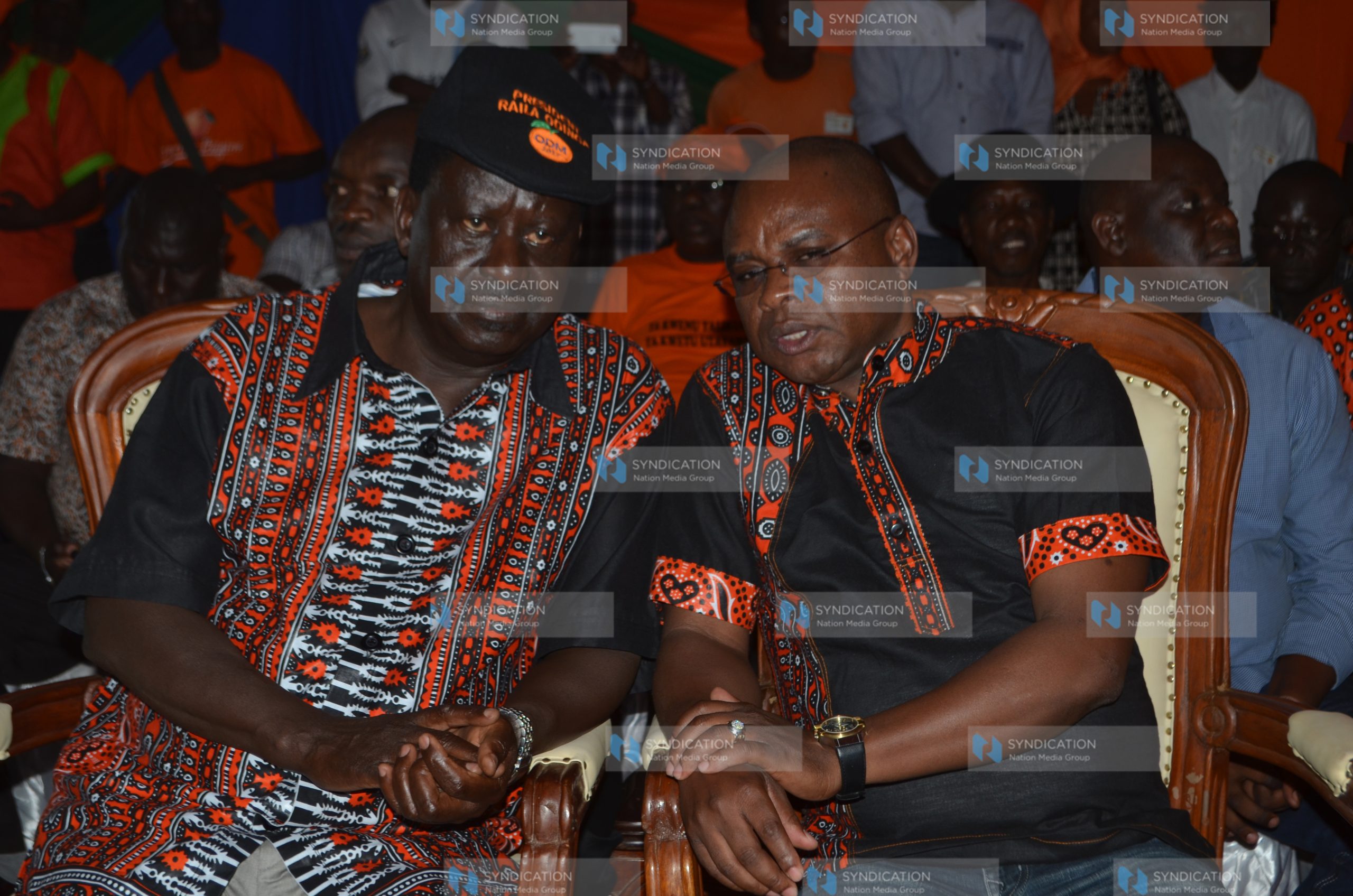 Raila Odinga share a word with Kilifi Governor Amason Kingi