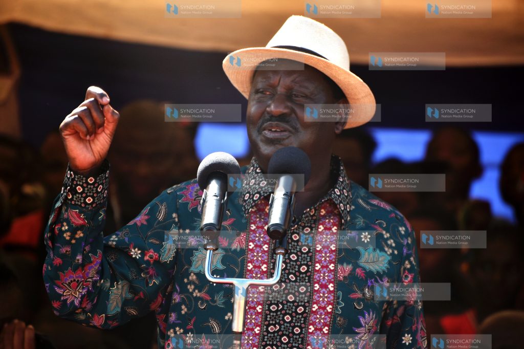 ODM leader Raila Odinga shares a light moment with Mombasa Governor Hassan Joho