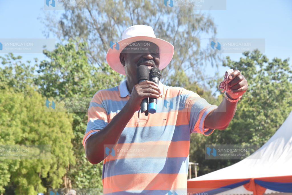 Raila Odinga addresses residents during a rally at Matuga Girls High School