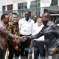 President William Ruto shakes hands with Abdi Duale