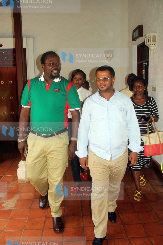 Hassan Omar together with Member of parliament Wafula Wamunyinyi