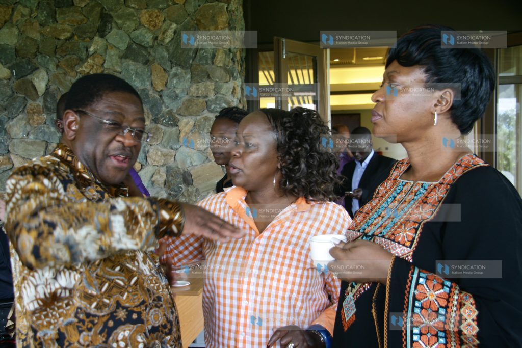 Senator Amos Wako with Millie Odhiambo and Elizabeth Ongoro