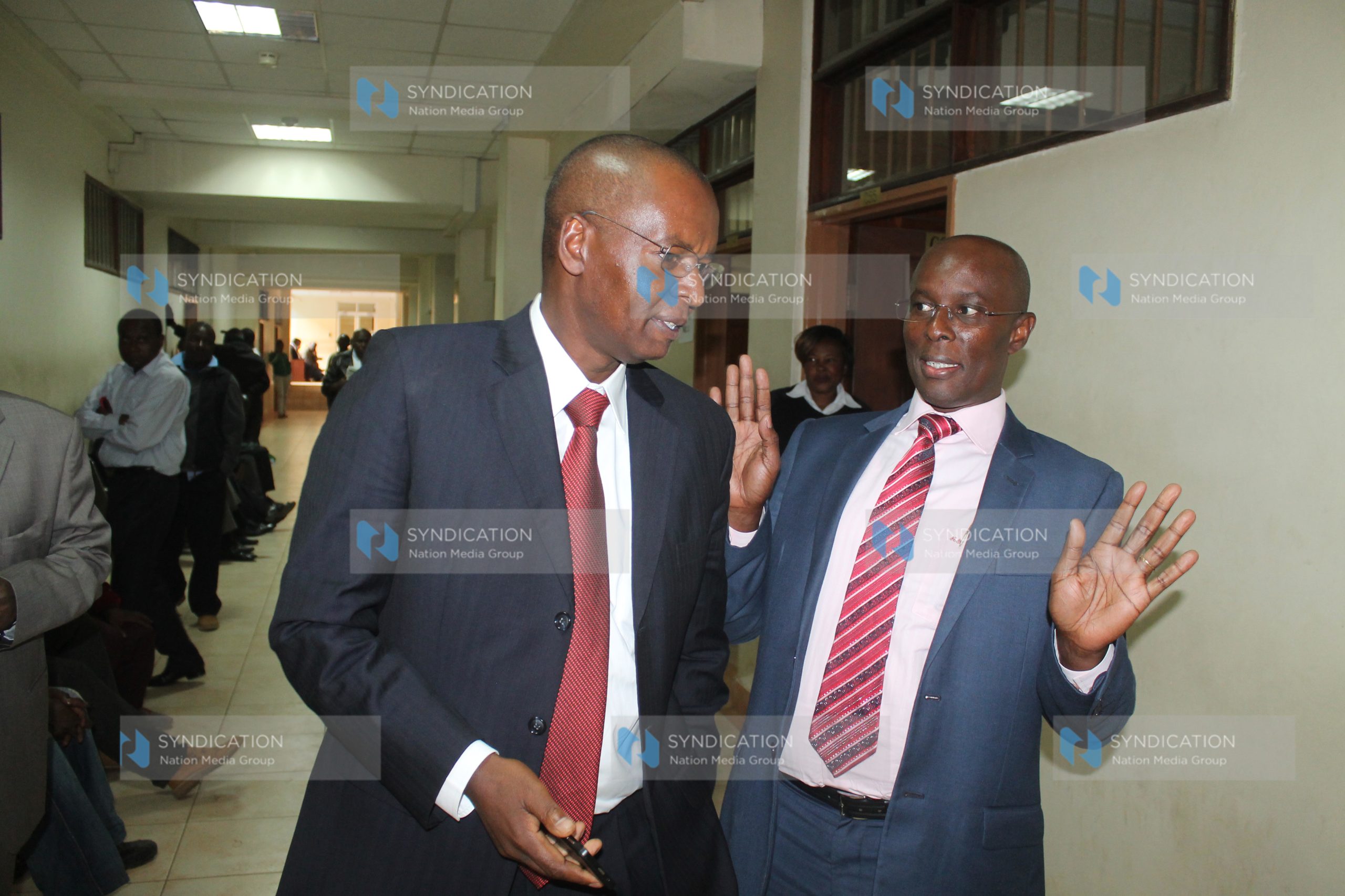 Former Lands Minister Amos Kimunya with his lawyer Mwaniki Gachoka