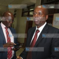 Former Lands Minister Amos Kimunya with his lawyer Mwaniki Gachoka