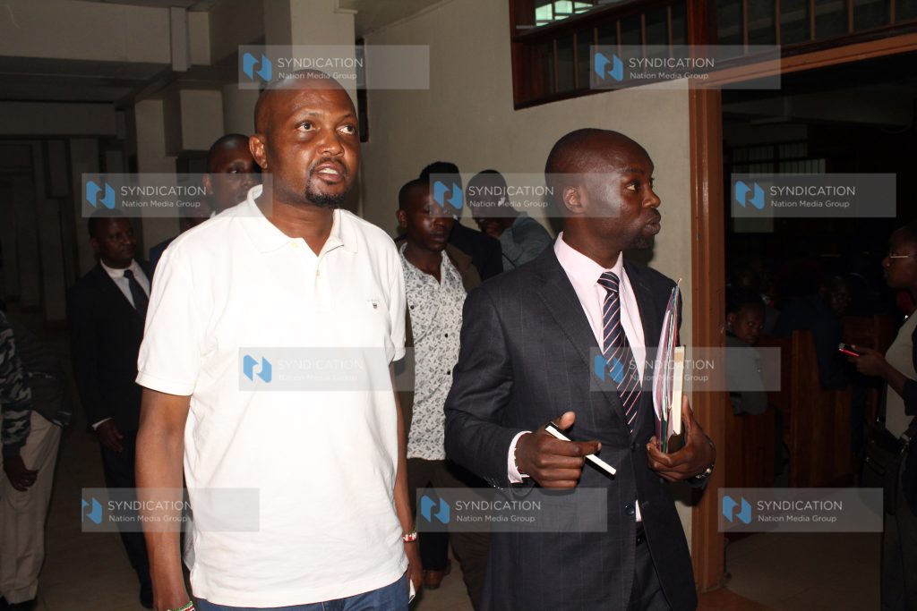 Gatundu South MP Moses Kuria leaving a Milimani Law court