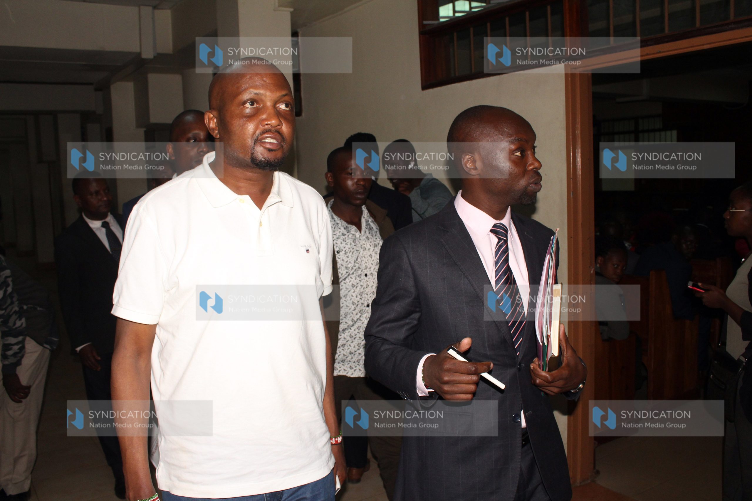 Gatundu South MP Moses Kuria leaving a Milimani Law court