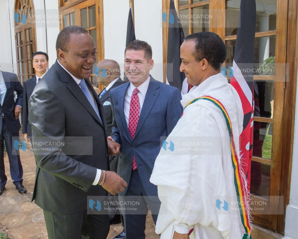 President Uhuru Kenyatta chats with the new US Ambassador to Kenya, H.E. Kyle McCarter and H.E. Meles Alem Tekea, the new Ambassador of the Federal Republic of Ethiopia to Kenya