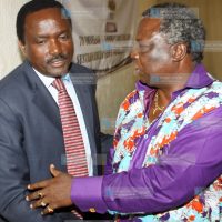 Vice president Kalonzo Musyoka (left), chats with COTU Secretary General Francis Atwoli