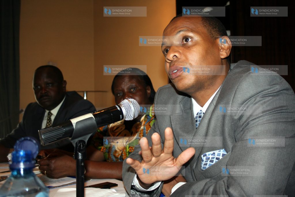 Garsen MP Danson Mungatana adressing participants during a Public Forum debate