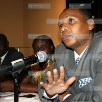 Garsen MP Danson Mungatana adressing participants during a Public Forum debate