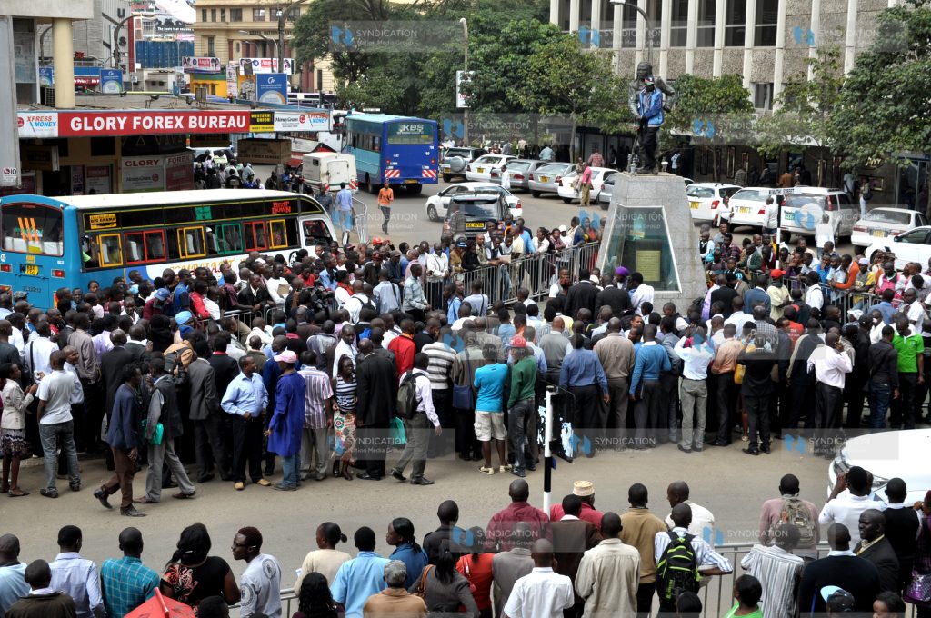 Dedan Kimathi Waceke,chained himself on the Statue of Dedan Kimathi