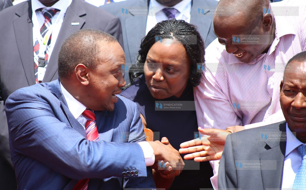 President Uhuru Kenyatta (left) meeting some of Kenyans in diaspora