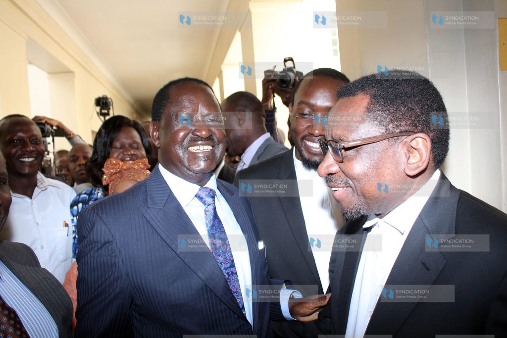 Raila Amollo Odinga with Siaya Senator James Orengo at the Supreme Court buildings